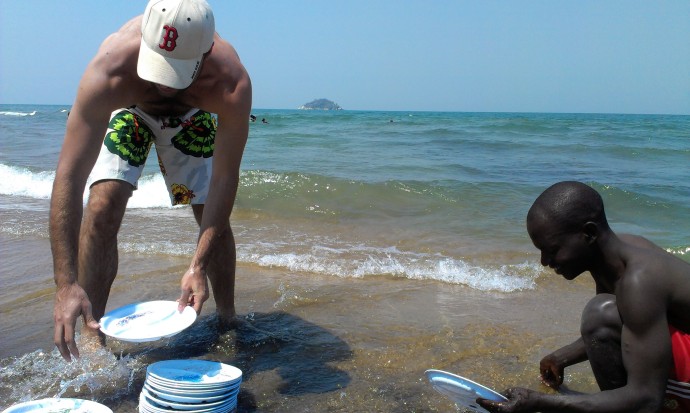 Seth and Francisco washing up, Malawian style